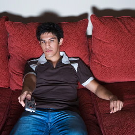 Man-on-sofa-watching-TV--010